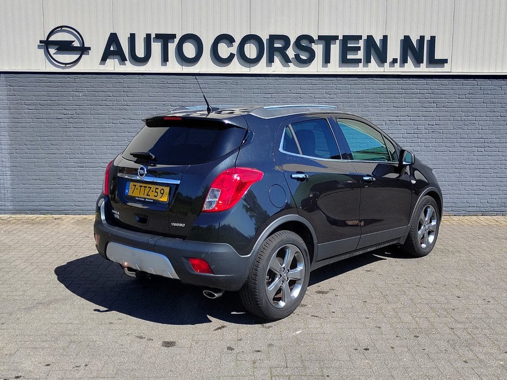 Opel Mokka 1.4T 141pk Cosmo Trekhaak Navi Camera AGR Comfort, Auto's, Opel, Voorwielaandrijving, Euro 5, 4 cilinders, Leder en Stof