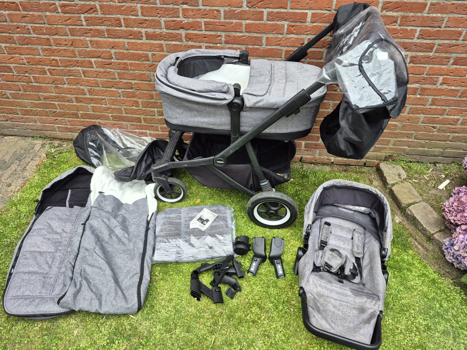 Thule Sleek Combiwagen met Reiswieg en Zitje, Ophalen, Gebruikt, Overige merken, Verstelbare duwstang