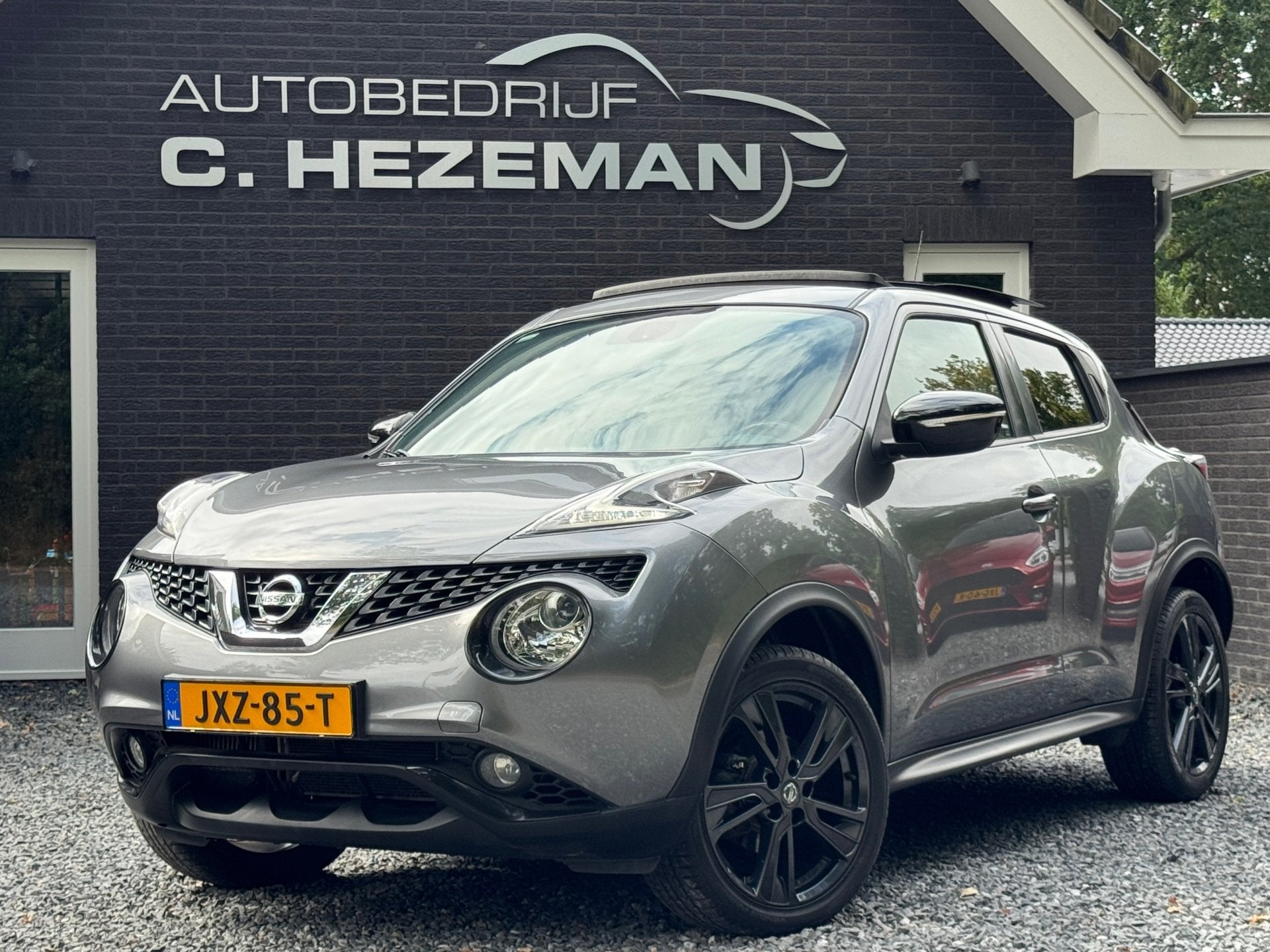 Nissan Juke 1.2 116PK PANORMADAK 1E EIG Camera Navi Cruise D, Auto's, Nissan, Voorwielaandrijving, Gebruikt, Zwart, 4 cilinders