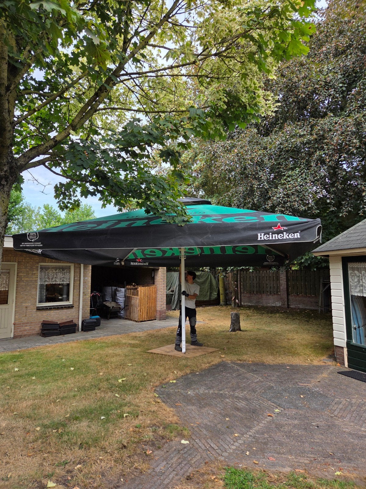 Grote Heineken parasol 5x5m, Ophalen, Meer dan 4 meter, Stokparasol