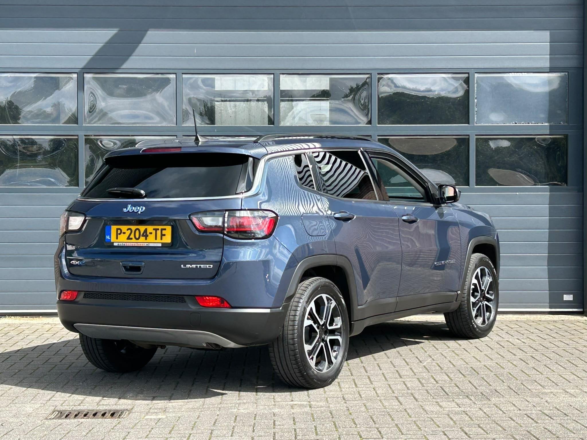 JEEP COMPASS 4xe 240 PLUG-IN HYBRID ELECTRIC LIMITED I WINTE, Automaat, 4 cilinders, Met garantie (alle), Blauw
