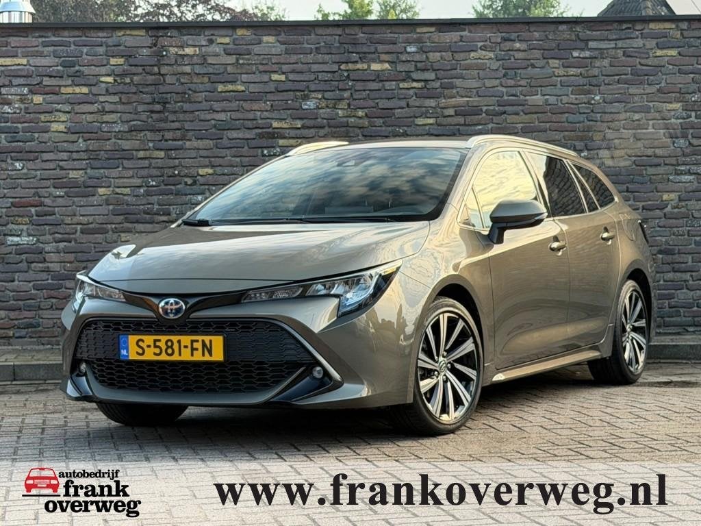 Toyota COROLLA 1.8 HYBRID Automaat Navi Camera Trekhaak ACC, 1345 kg, 750 kg, Corolla, Hybride Elektrisch/Benzine