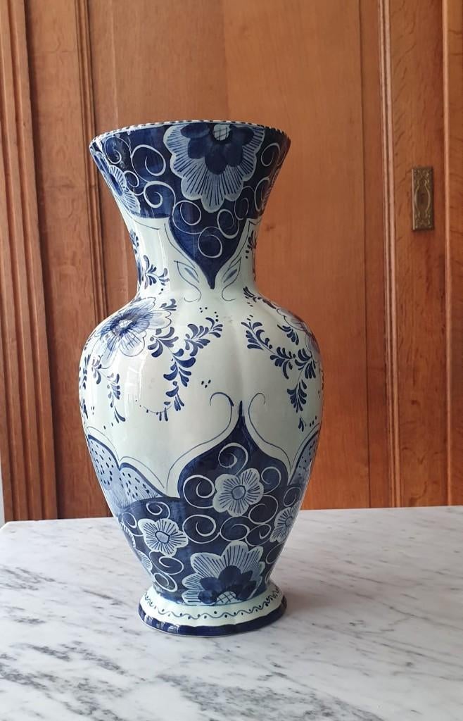 Delfts blauwe vaas, Ophalen