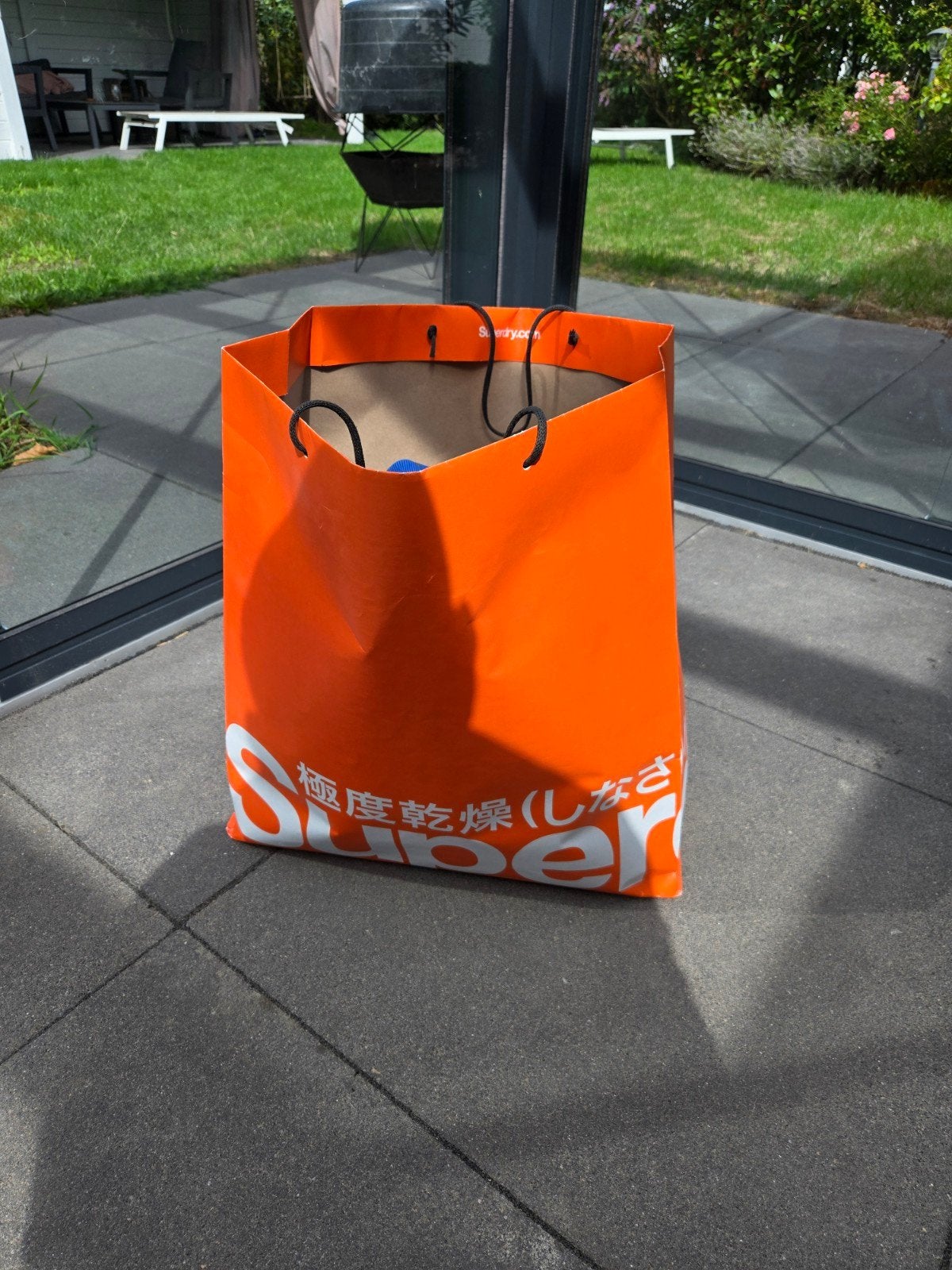 SuperDry volle tas met kleding, Ophalen of Verzenden, Gedragen, Maat 52/54 (L)
