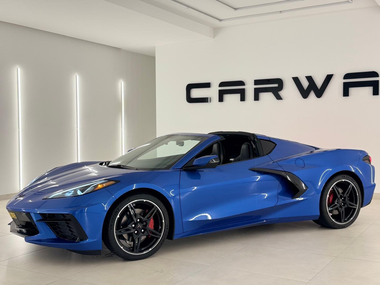Chevrolet Corvette C8 6.2 V8 Stingray Targa NL (bj 2021), Auto's, Automaat, Automatische klimaatregeling, Gebruikt, Blauw