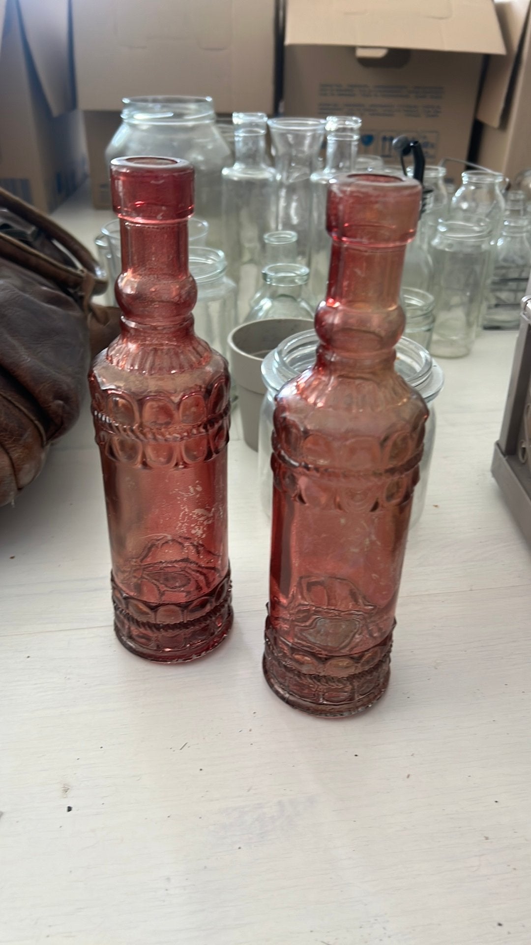 2 roze flesjes, Ophalen of Verzenden, Zo goed als nieuw