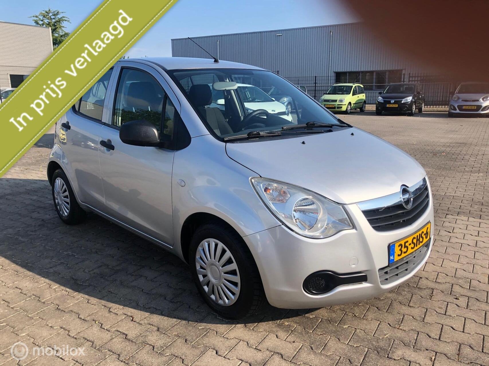 Opel Agila 1.0 5DRS HOOGZIT NED AUTO 57.539 KM N.A.P, Auto's, Euro 5, Stof, Gebruikt, Origineel Nederlands