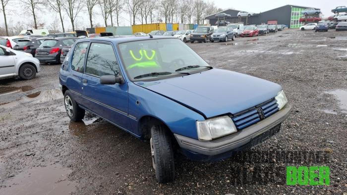 Koplamp rechts van een Peugeot 205, Gebruikt, -, -, Ophalen of Verzenden