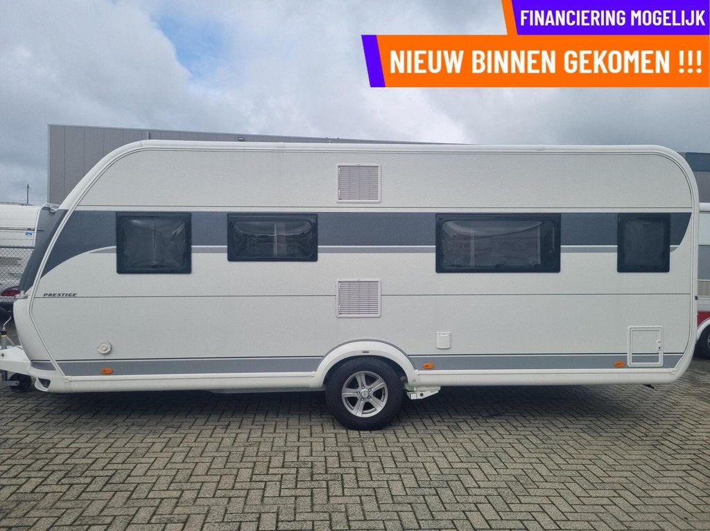 HOBBY PRESTIGE 560 WLU ENKELE BEDDEN + DEELTENT+MOVER+DOUCHE, Caravans en Kamperen, Caravans, Rondzit, Hobby, 7 tot 8 meter, Bedrijf