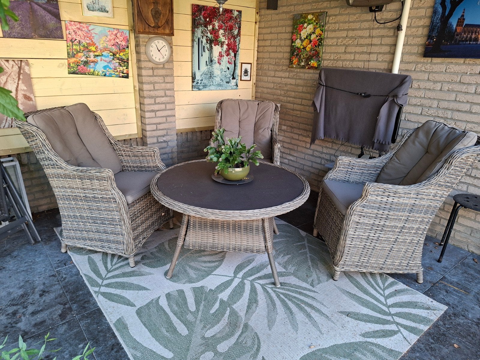 Wicker tuinset met 4 stoelen en ronde tafel