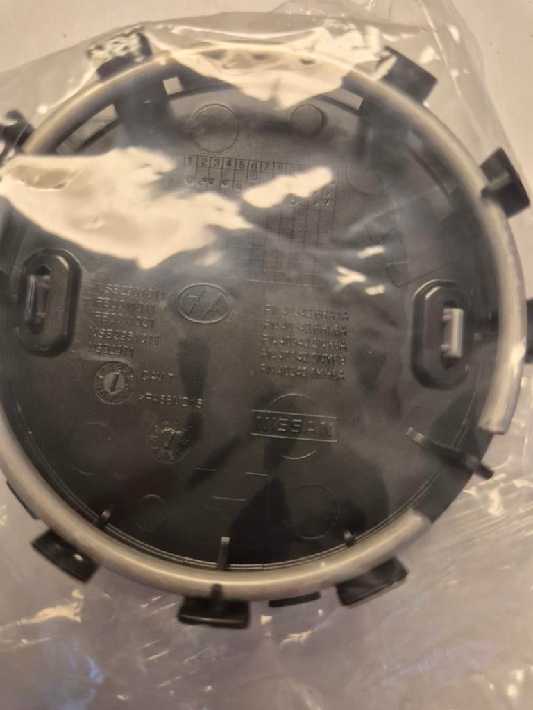Originele nieuwe NISSAN naafdoppen 60mm., Ophalen of Verzenden, Nieuw, Nissan