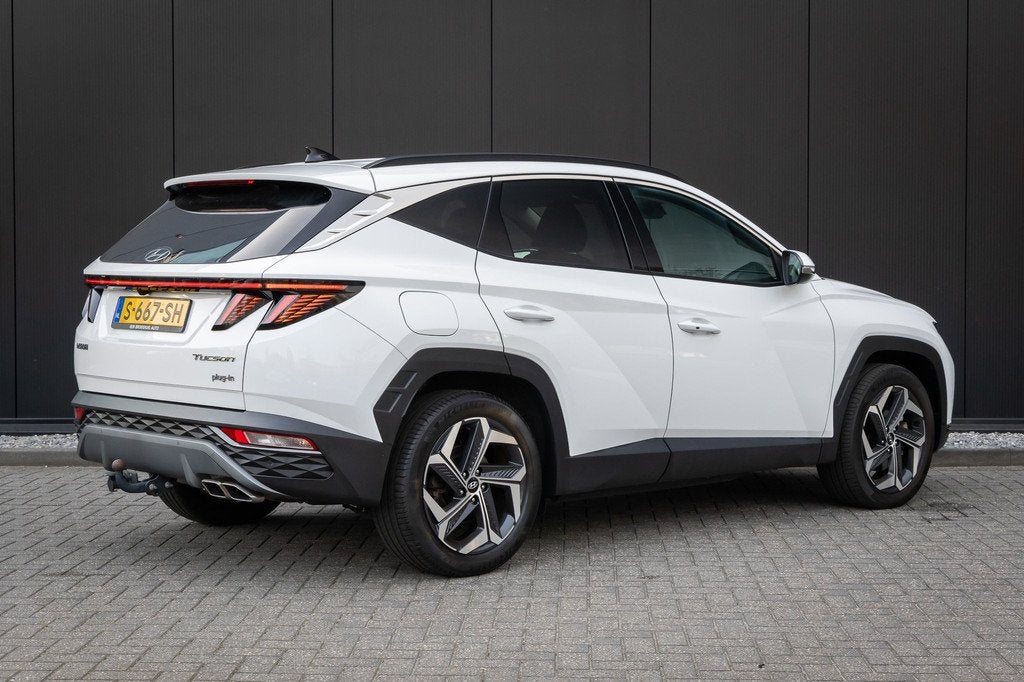Hyundai TUCSON 1.6 T-GDI 265pk PHEV Comfort Smart 4WD Automa, Gebruikt, 4 cilinders, Wit, Origineel Nederlands