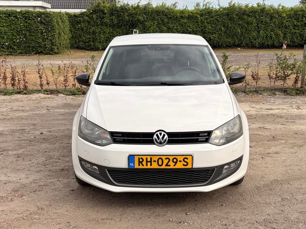 Volkswagen Polo 1.2 2012 stoelverwarming Cruise control, Auto's, Voorwielaandrijving, 967 kg, 40 €/maand, Zwart