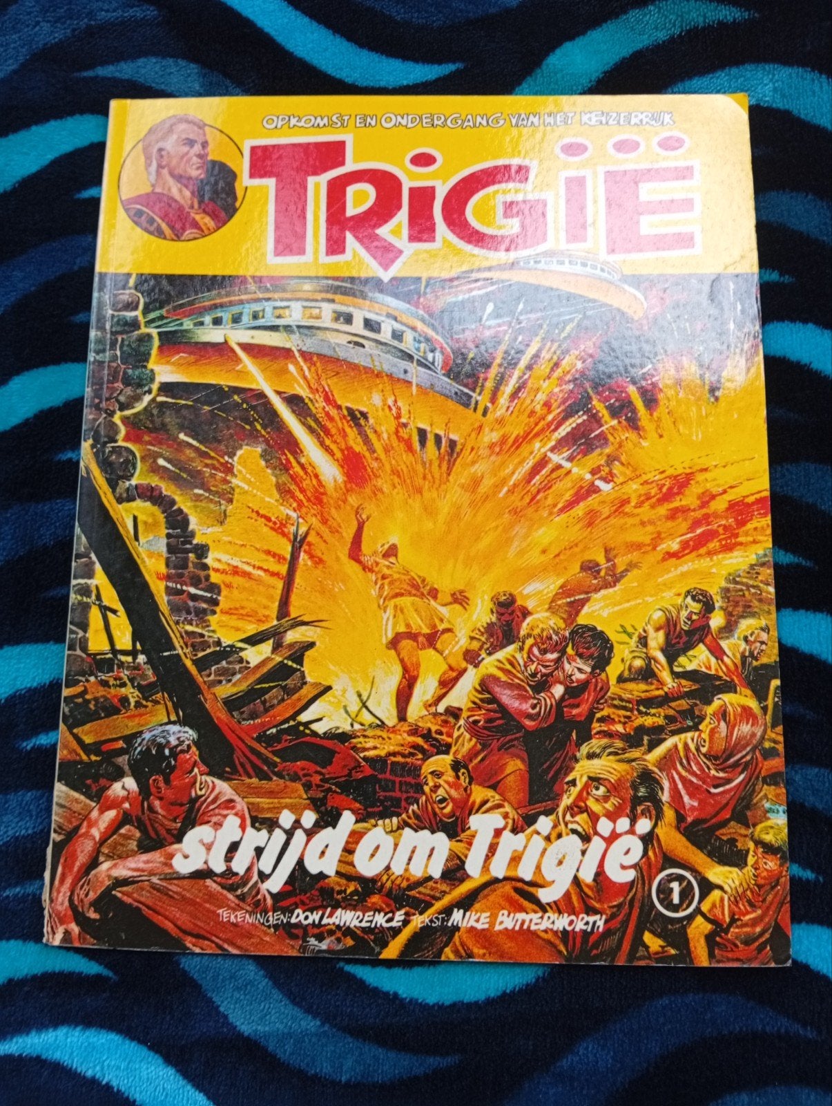 Trigië: Strijd om Trigië (1) - Don Lawrence, Mike Butterwort, Ophalen of Verzenden