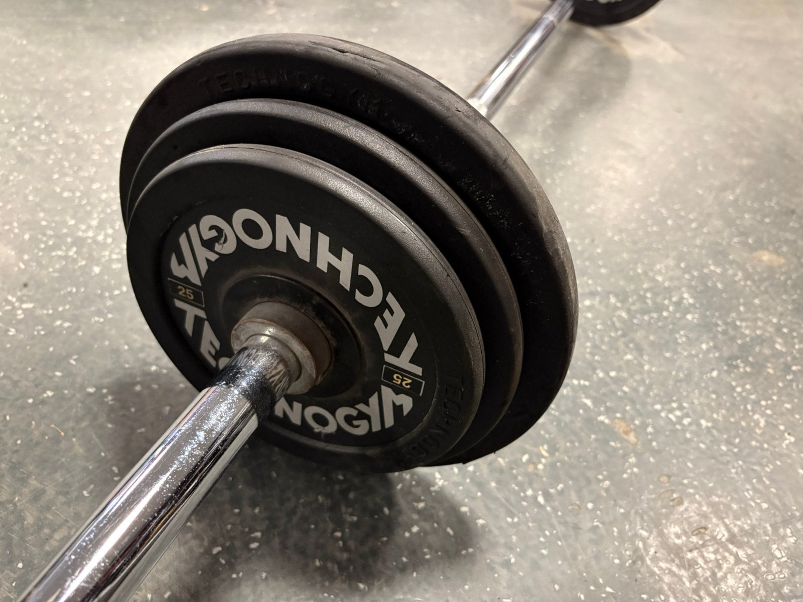 25 kg technogym vaste halter stang gewichten, Ophalen of Verzenden, 25 kg, Halter stang, Halterset