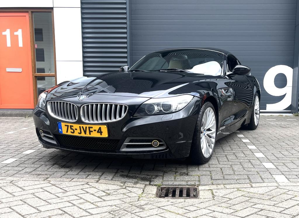BMW Z4 2.5 Roadster Sdrive 23I AUT 2009 Zwart, Auto's, Automaat, Achterwielaandrijving, Beige, 2497 cc