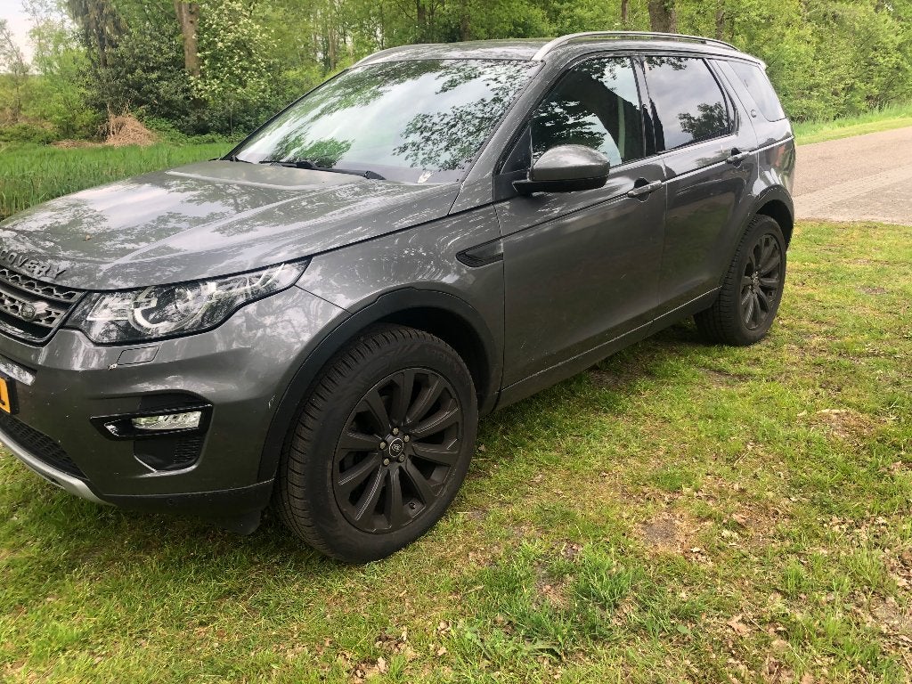 Land Rover Discovery Sport 2.2 SD4 4WD Aut9 2015 Grijs, Auto's, Land Rover, Automaat, Beige, Leder, Diesel