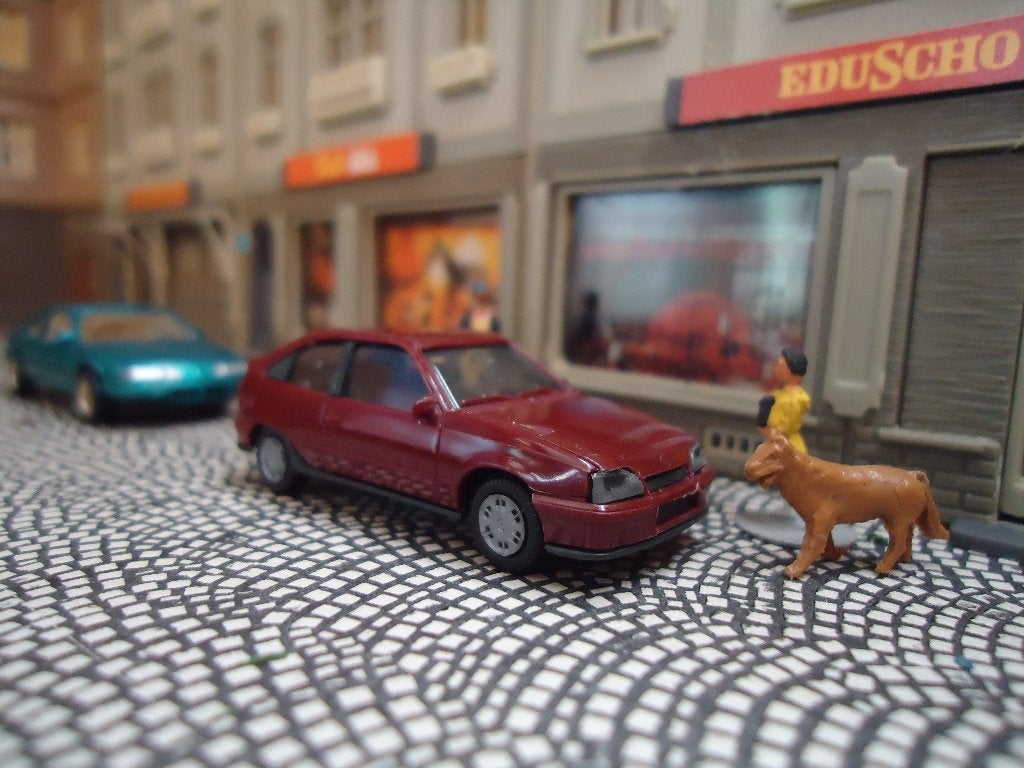 Opel Kadett E Gsi - Herpa donkerrood, Ophalen of Verzenden, Zo goed als nieuw, Auto, Herpa