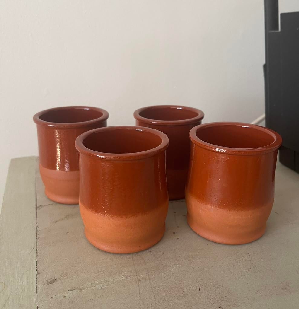 Kopjes van terracotta 4x, Ophalen