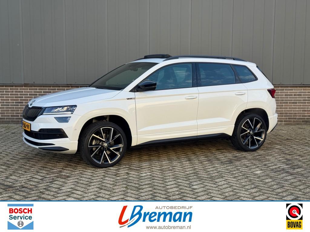 Skoda KAROQ 1.5 TSI ACT SPORTLINE BUSINESS DSG Panodak trekh, Auto's, Skoda, Automaat, 4 cilinders, Wit, Karoq