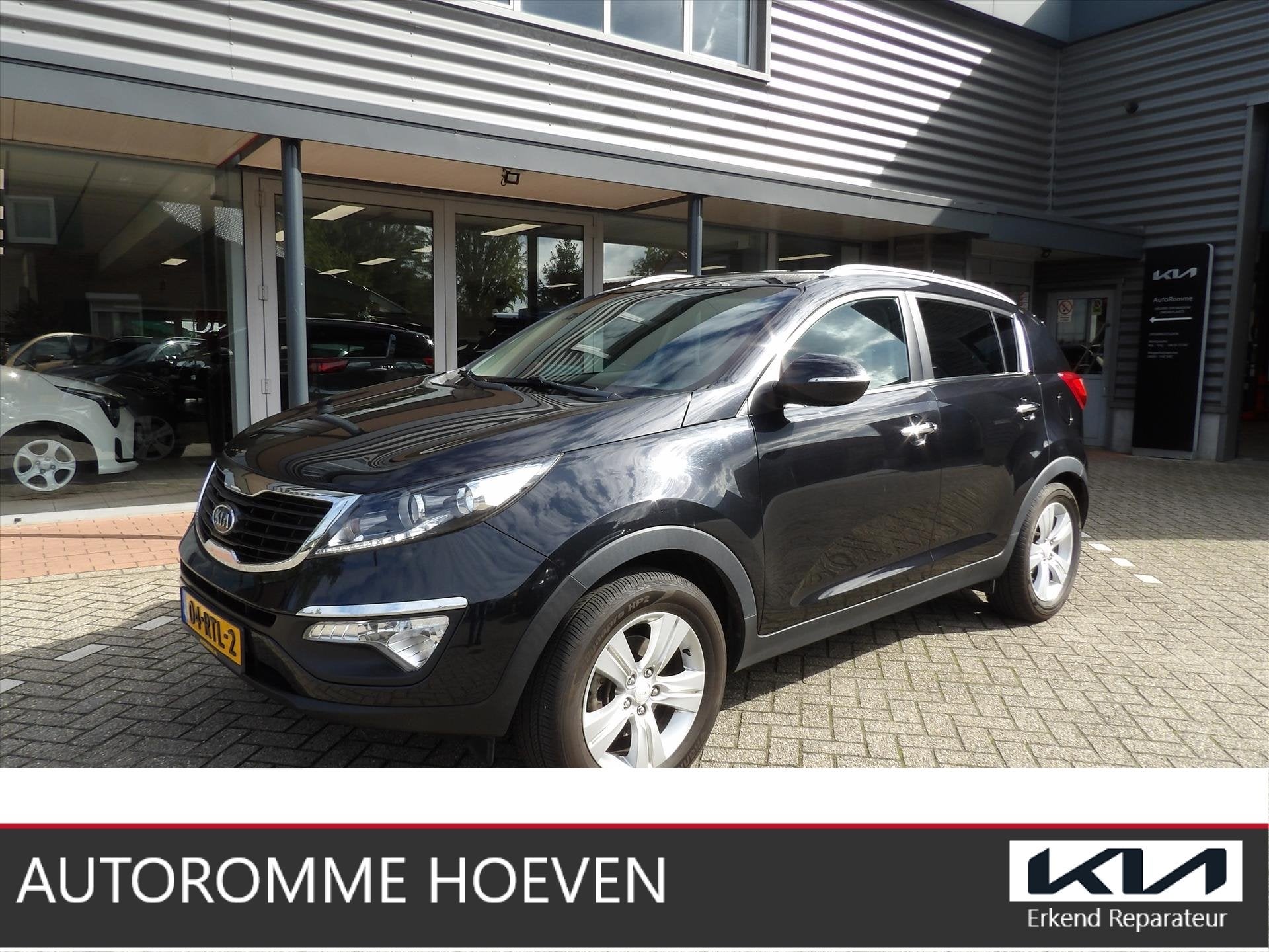 KIA Sportage 1.6 GDi X-ecutive Plus Pack Org. Ned dealer Ond, Auto's, 135 pk, 4 cilinders, Leder en Stof, Zwart