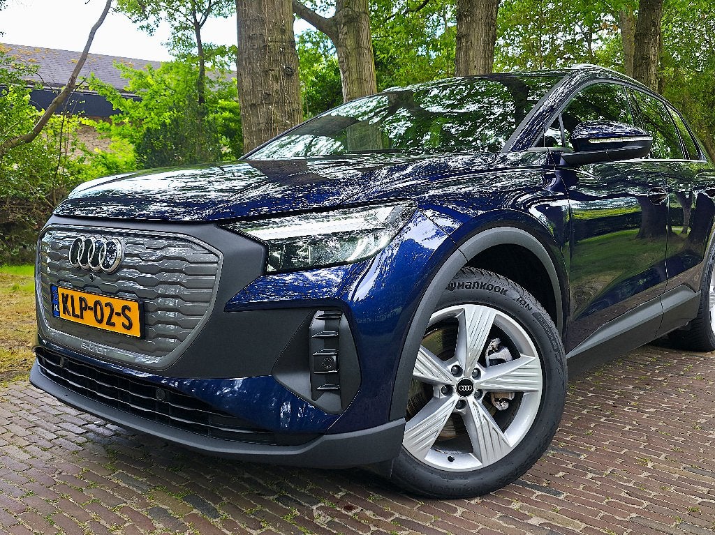Audi Q4 40 e-tron Navarra Blue | 2023 | SOH 95% | Garantie, Auto's, Automaat, Blauw, Q4 e-tron, 204 pk