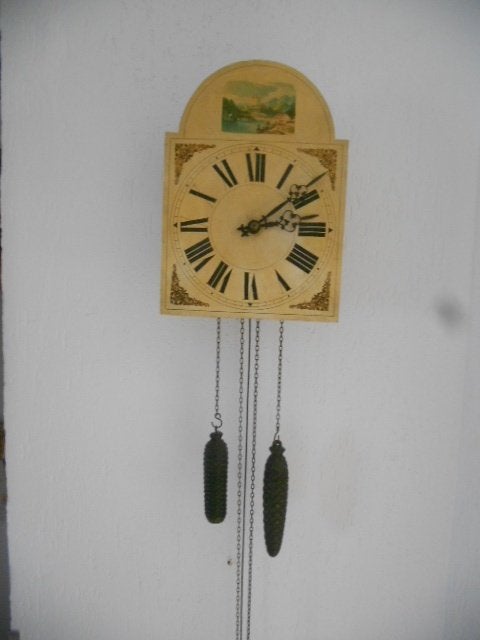 Oude (antieke) Schwarzwalder klok, Ophalen