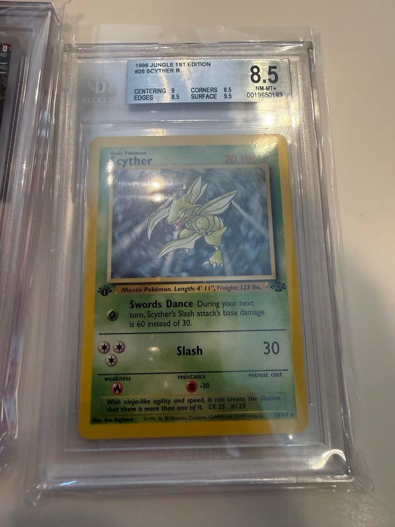 Pokémon Scyther 1999 Jungle 1st Edition BGS 8.5, Ophalen of Verzenden, Zo goed als nieuw, Losse kaart