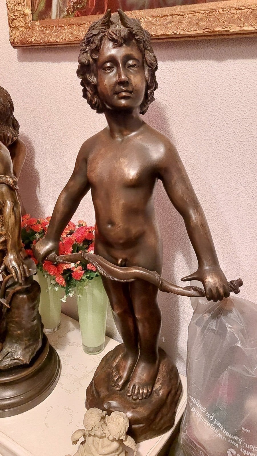 groot bronzen beeld Gesigneerd jongen met boog, Ophalen