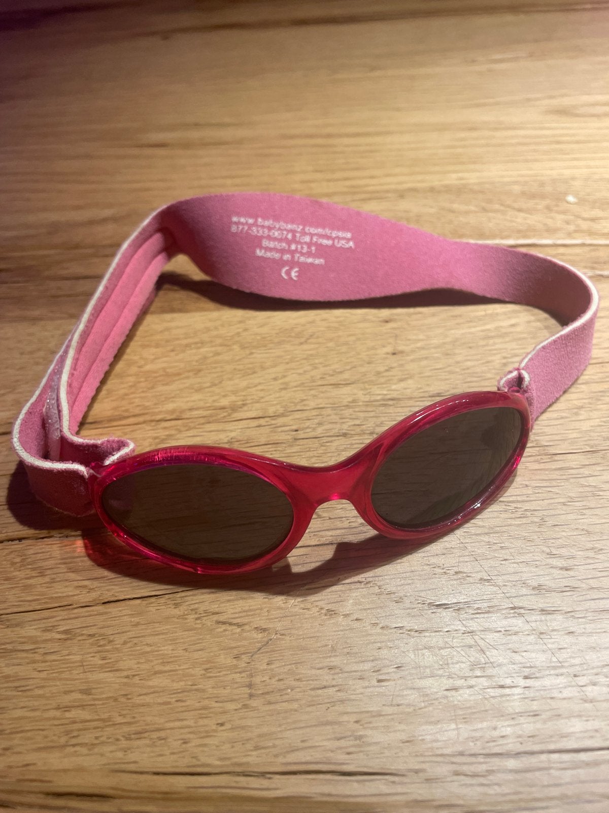 Roze Kidz Banz zonnebril, Kinderen en Baby's, Overige Kinderen en Baby's, Ophalen of Verzenden, Gebruikt