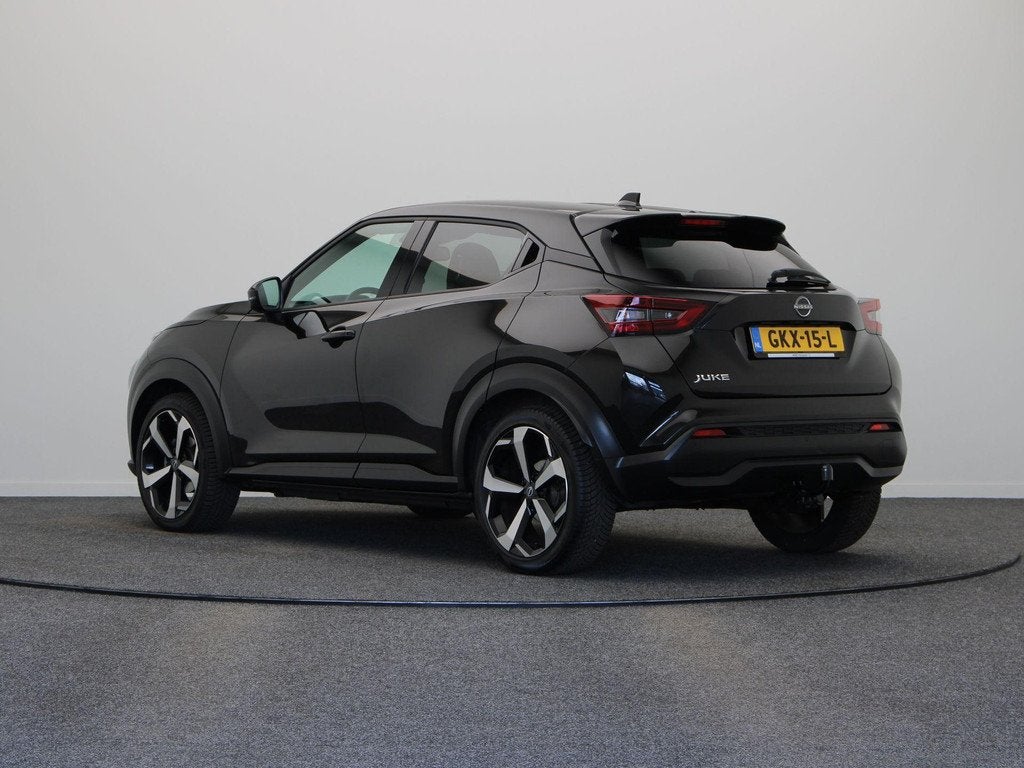 Nissan Juke 1.0 DIG-T Tekna | Leer | Trekhaak | Bose audio |, Auto's, Nissan, Euro 6, Leder en Stof, Zwart, Bedrijf