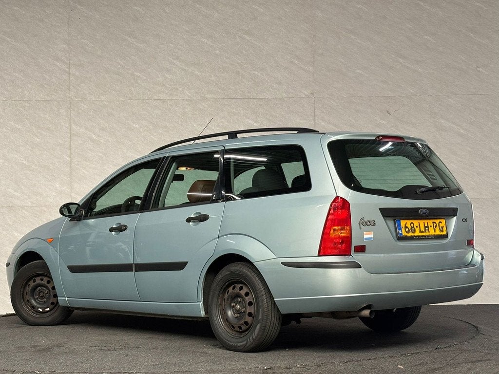 Ford Focus Wagon 1.4-16V Cool Edition - Airco - Leder - NAP, Auto's, 15 km/l, Gebruikt, 4 cilinders, Origineel Nederlands