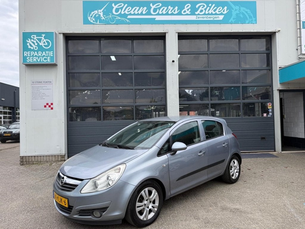 Opel Corsa 1.4-16V Enjoy (bj 2009, automaat), Auto's, Opel, 15 km/l, Gebruikt, Elektrische ramen, 4 cilinders