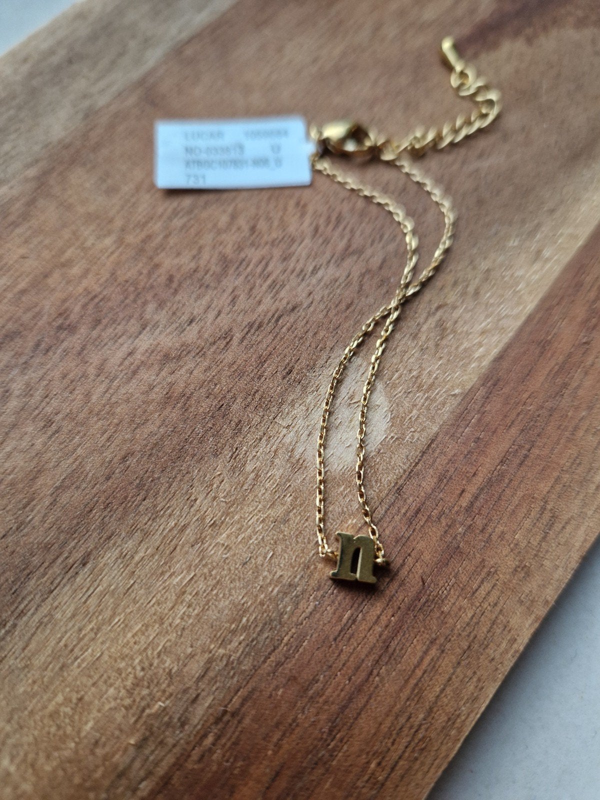 Gouden armband met letter 'n' hanger, Ophalen of Verzenden, Nieuw, Goud, Overige materialen