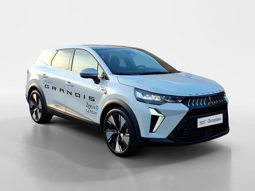 Mitsubishi Grandis 1.8 HEV Instyle Demo auto | meest complet, Auto's, Mitsubishi, 12 maanden, 730 kg, 1789 cc, Wit