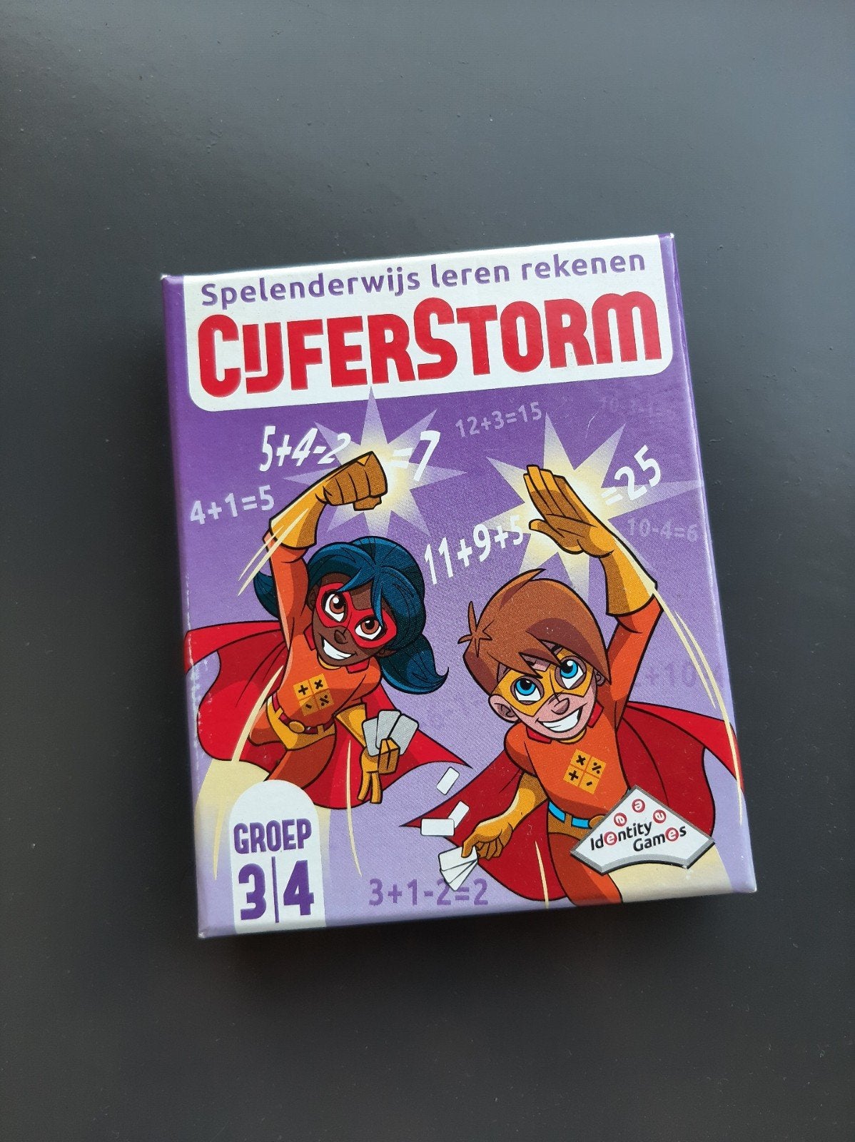 Spel Cijferstorm, Drie of vier spelers, Ophalen of Verzenden, Zo goed als nieuw, Identity Games