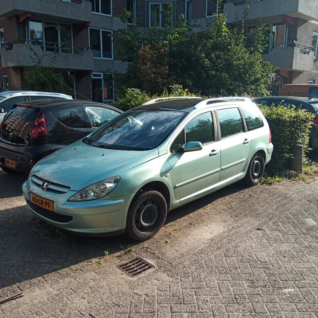 Peugeot 307sw 2003 - RIJDT NIET - OPHALEN VOOR DE SLOOP, Auto's, Peugeot, Zwart, 4 cilinders, Origineel Nederlands, Stationwagon