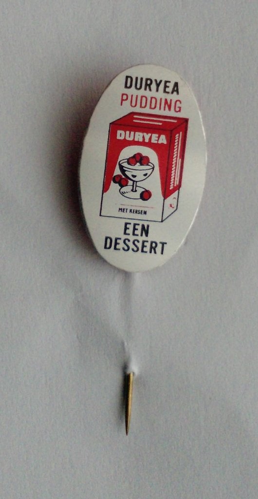 Speldje Duryea Pudding "een dessert", Verzamelen, Ophalen of Verzenden, Zo goed als nieuw, Merk, Speldje of Pin