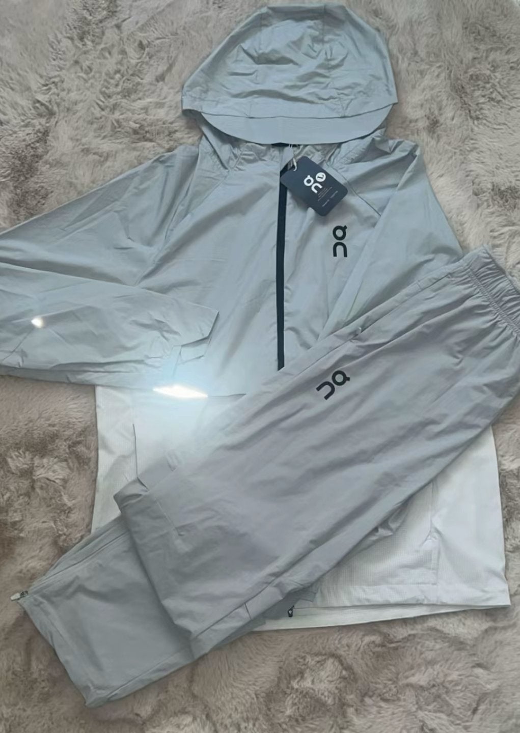 OnCloud trainingspak, Kleding | Heren, Sportkleding, Maat 52/54 (L), Ophalen of Verzenden, Zo goed als nieuw, Grijs