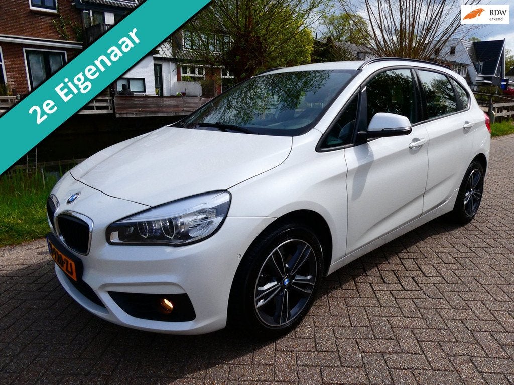 BMW 2-serie Active Tourer 218i High Exe 136pk Automaat 2e ei, Auto's, BMW, 1345 kg, 136 pk, Gebruikt, Wit