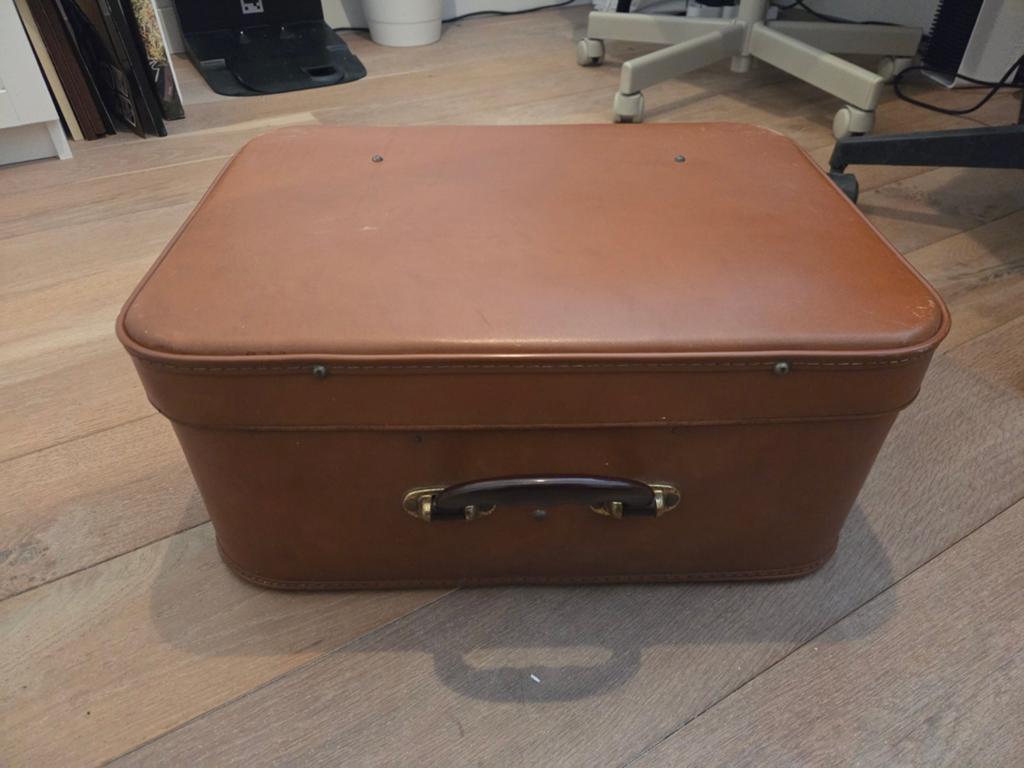 Oude naaimachine merk Fridor, Ophalen