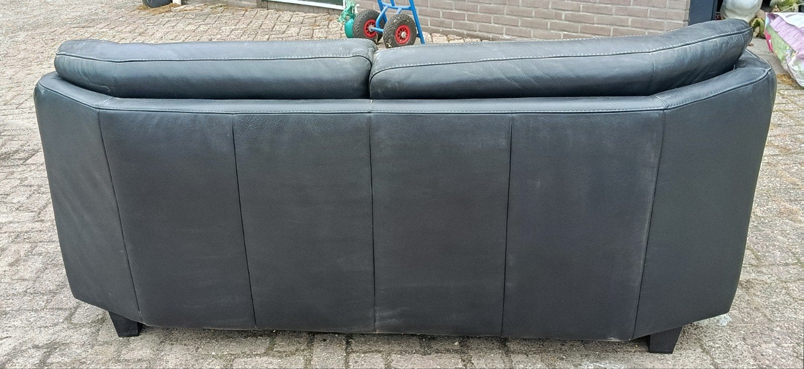 2 Zwarte leren banken 6 eettafel stoelen en een zit stoel, Huis en Inrichting, Gebruikt, Minder dan 75 cm, Ophalen of Verzenden
