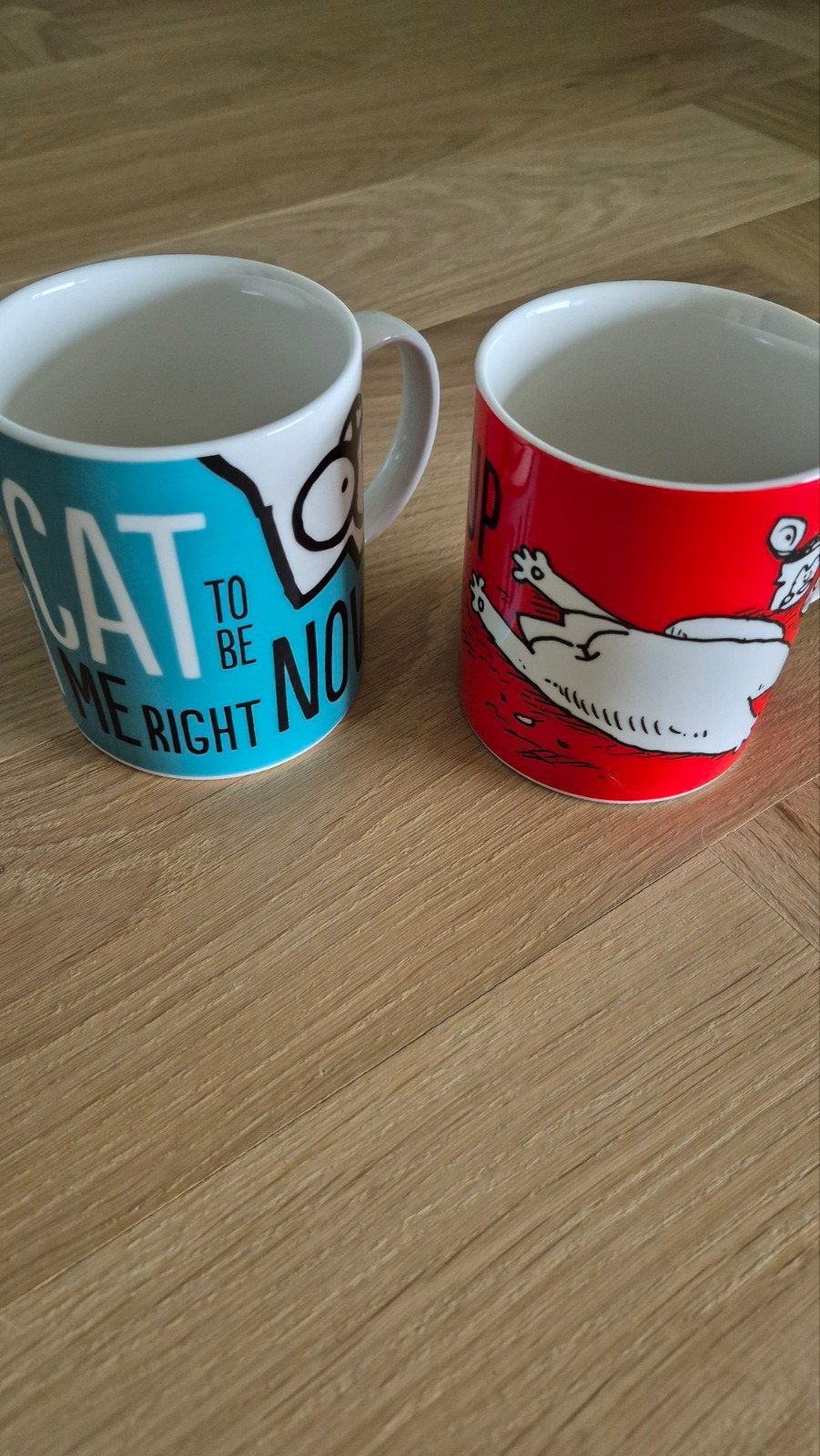 Twee mokken van Simon's Cat (blauw/rood/kat/merchandise), Ophalen of Verzenden, Nieuw, Aardewerk, Kop(pen) en/of Schotel(s)