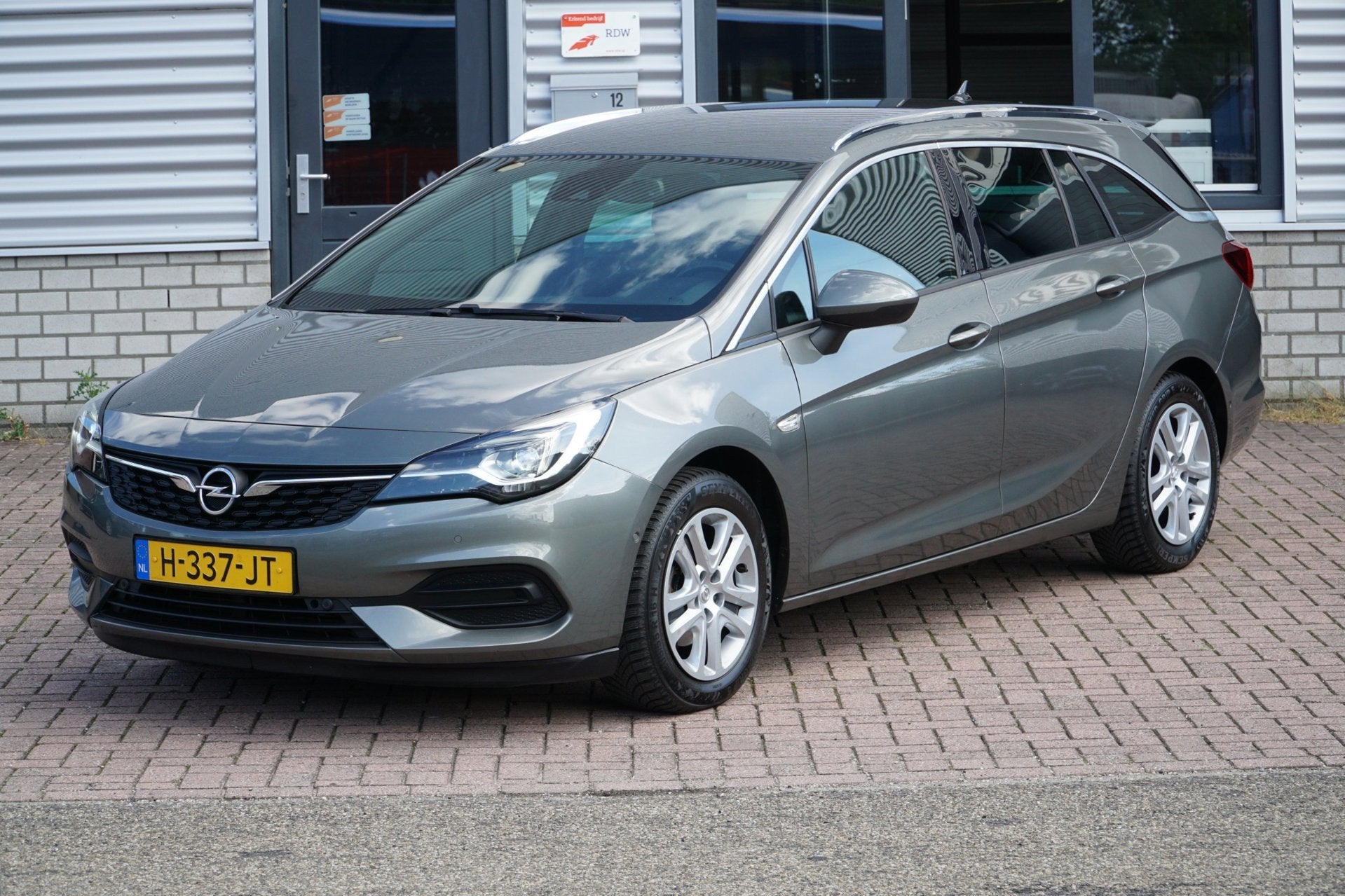 Opel Astra Sports Tourer 1.2 Elegance CAMERA TREKHAAK, Auto's, Opel, Voorwielaandrijving, Dealer onderhouden, Gebruikt, Euro 6