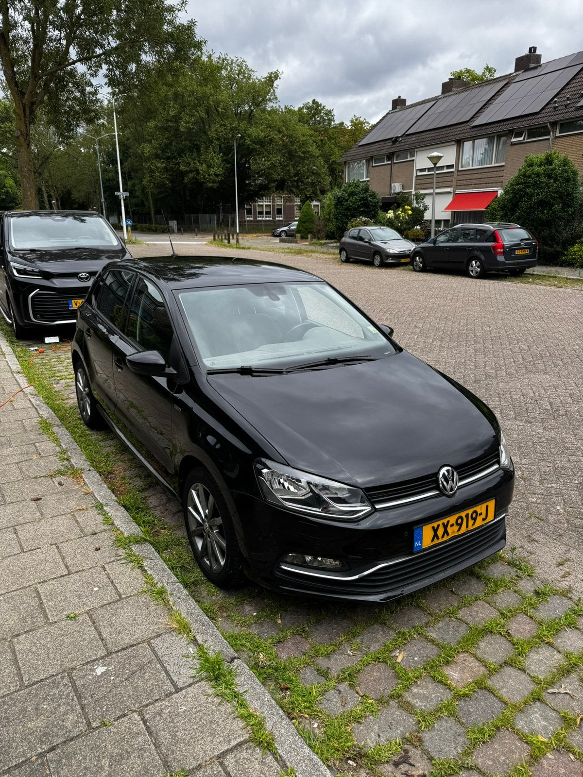 Volkswagen Polo 1.2 TSI 66KW DSG 2014 Zwart, 40 €/maand, 1039 kg, Leder en Stof, Zwart