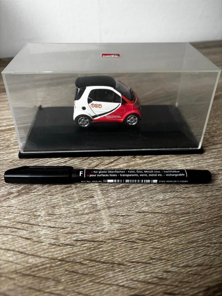 TNT smart City-Coupé, Hobby en Vrije tijd, Modelauto's | 1:43, Ophalen of Verzenden, Zo goed als nieuw, Auto, Overige merken