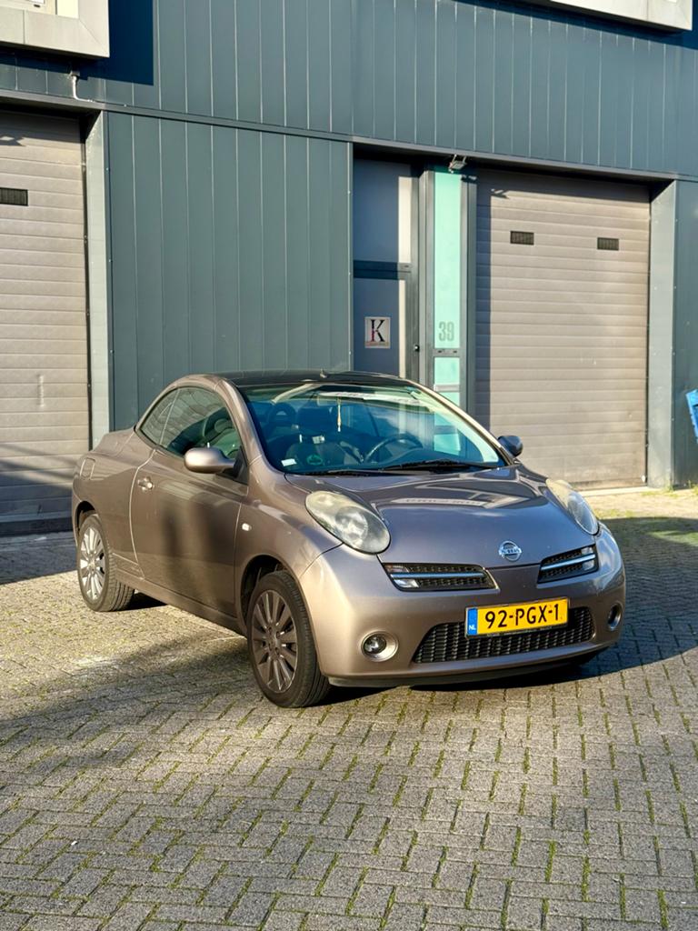 Nissan Micra 1.6 Cabrio 2006 Bruin Goed onderhouden, Auto's, Voorwielaandrijving, 15 km/l, 4 cilinders, 4 stoelen