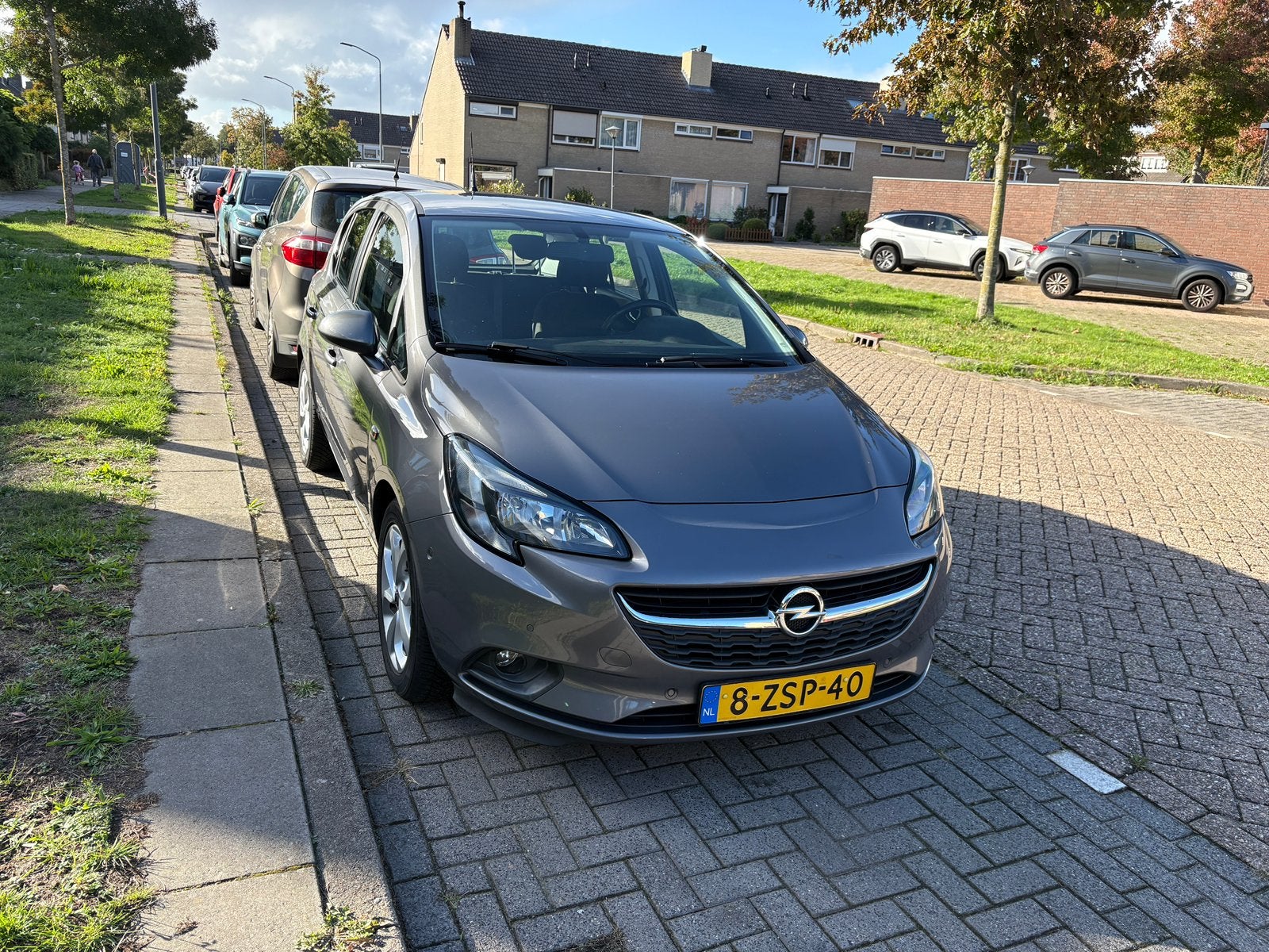 Opel Corsa 1.0T 66KW/90PK 5D 2015 Grijs, Auto's, Voorwielaandrijving, Origineel Nederlands, 1200 kg, Handgeschakeld
