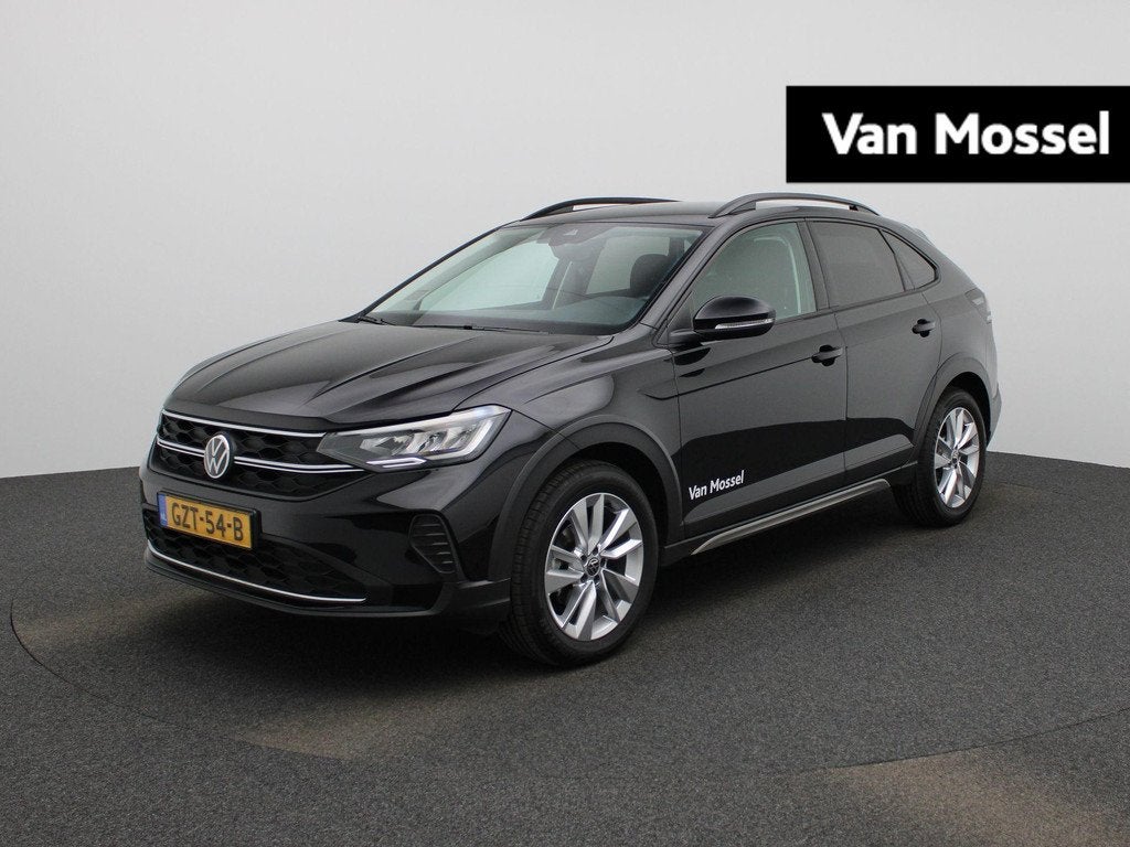 Volkswagen Taigo 1.0 TSI Oranje Edition 115 PK | Automaat |, Auto's, Volkswagen, 12 maanden, Stof, 116 pk, Zwart