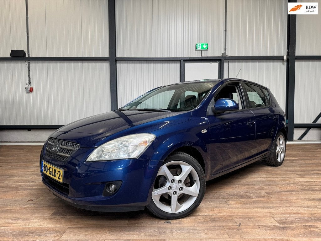 Kia Cee'd 1.6 X-clusive / LEDER / CLIMA / 5-Drs / Stoelverwa, Auto's, Kia, Gebruikt, 4 cilinders, Blauw, Handgeschakeld